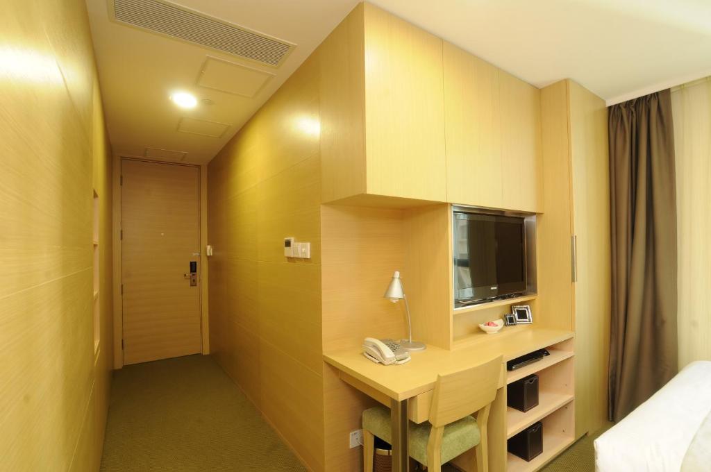 Causeway Corner Aparthotel Hongkong Szoba fotó