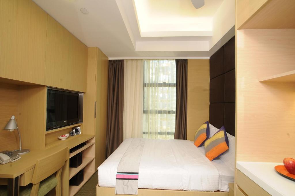 Causeway Corner Aparthotel Hongkong Szoba fotó