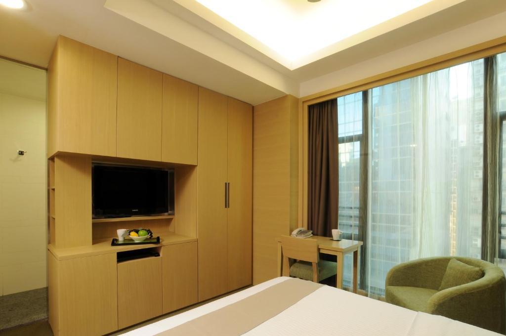 Causeway Corner Aparthotel Hongkong Szoba fotó